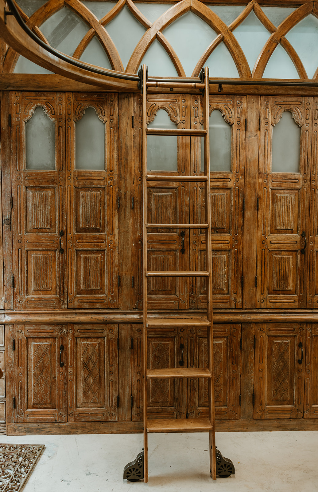 Custom closet made out of India building with shoe rack found only at Maurice's Furnishings in Jupiter, FL